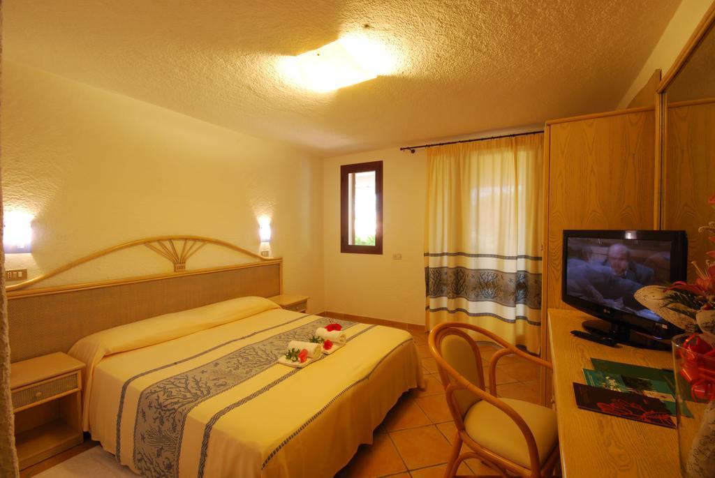 Hotel Mon Repos Baja Sardinia Quarto foto